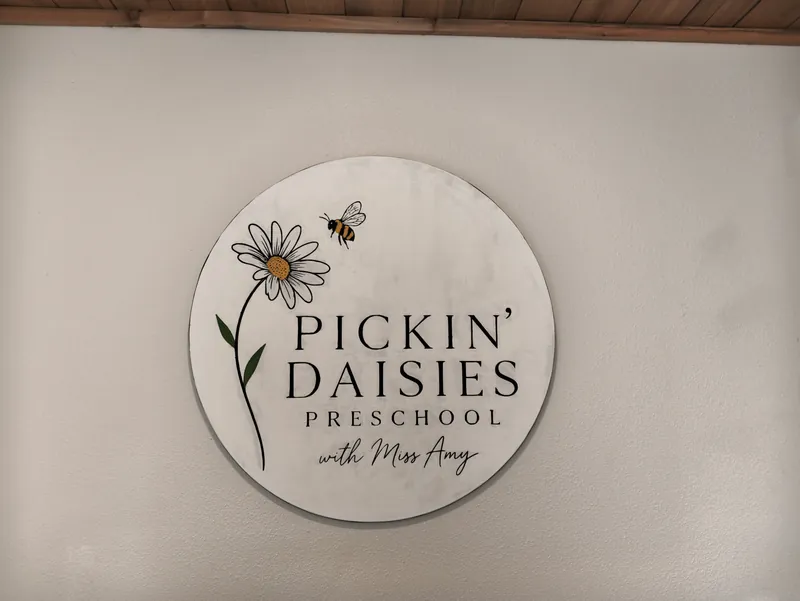 The Pickin&rsquo; Daisies Preschool with Miss Amy sign hanging inside the entry